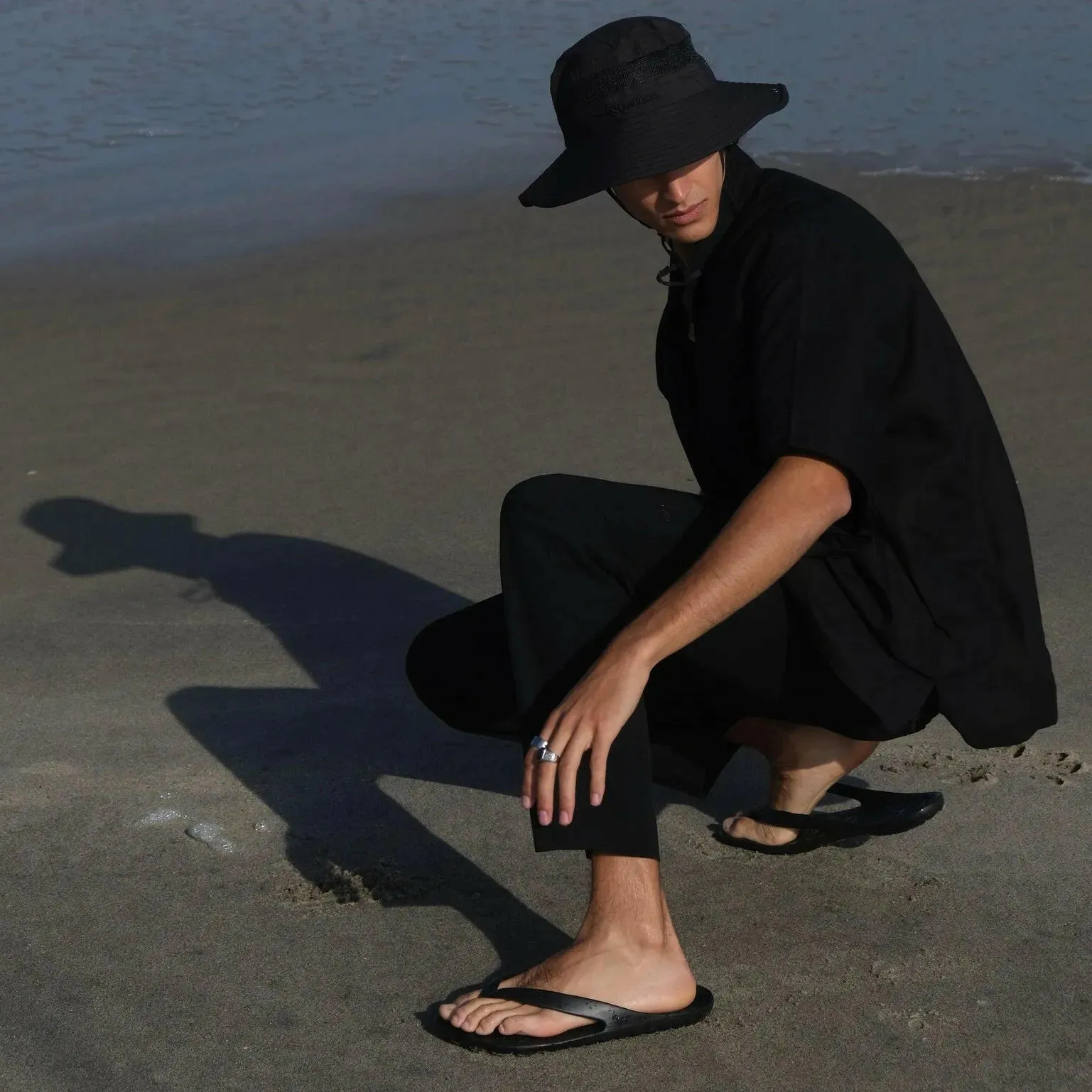 PIRATE BLACK FLIP FLOPS BY GUDO
